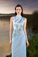 Blue sleeveless chiffon gown by Tracy Studio, elegant formal dress with flowing fabric and delicate design.