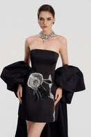Elegant Tracy Studio taffeta mikado mini dress with long sleeves, showcasing a stylish and sophisticated design.