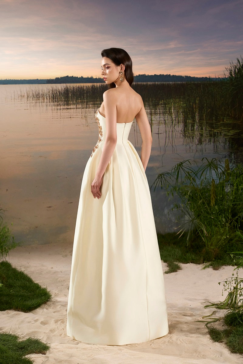 Elegant taffeta mermaid gown with a puffy cape from Tracy Studio, featuring a fitted silhouette and intricate detailing.