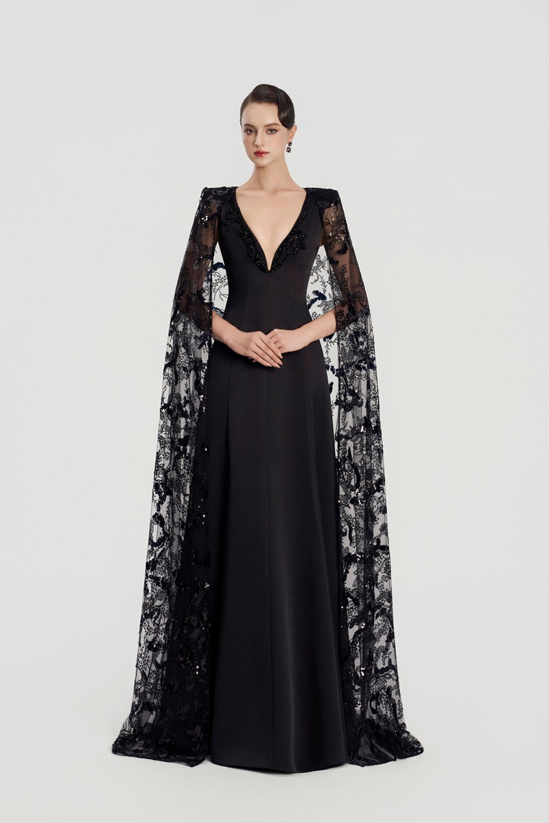 Black Taffeta Mikado deep V-neck maxi dress by Tracy Studio, elegant and flowing with a fitted waist and stylish design.