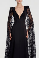 Black Taffeta Mikado deep V-neck gown by Tracy Studio, featuring elegant fabric and sophisticated design.