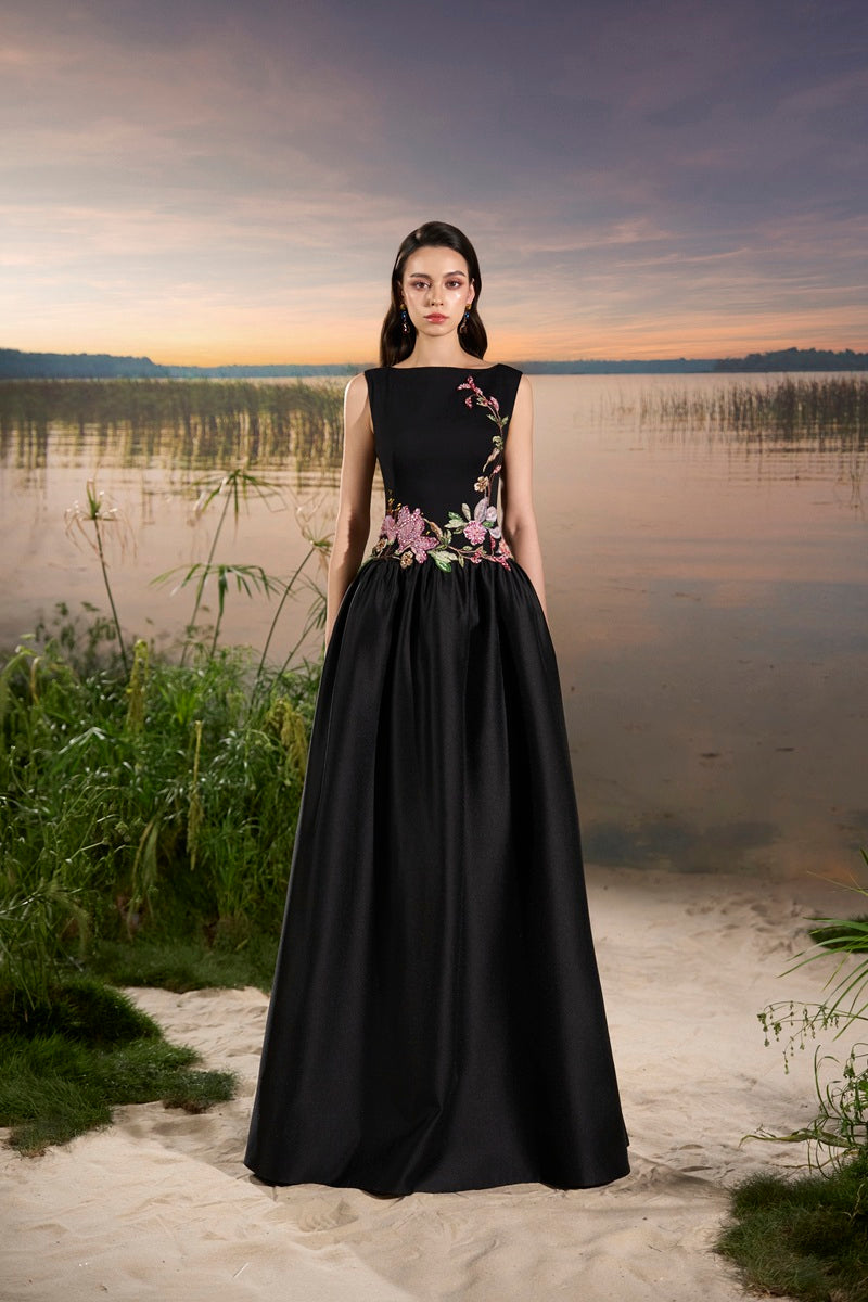 Black crepe embellished maxi dress by Tracy Studio, featuring elegant detailing and a flowing silhouette.