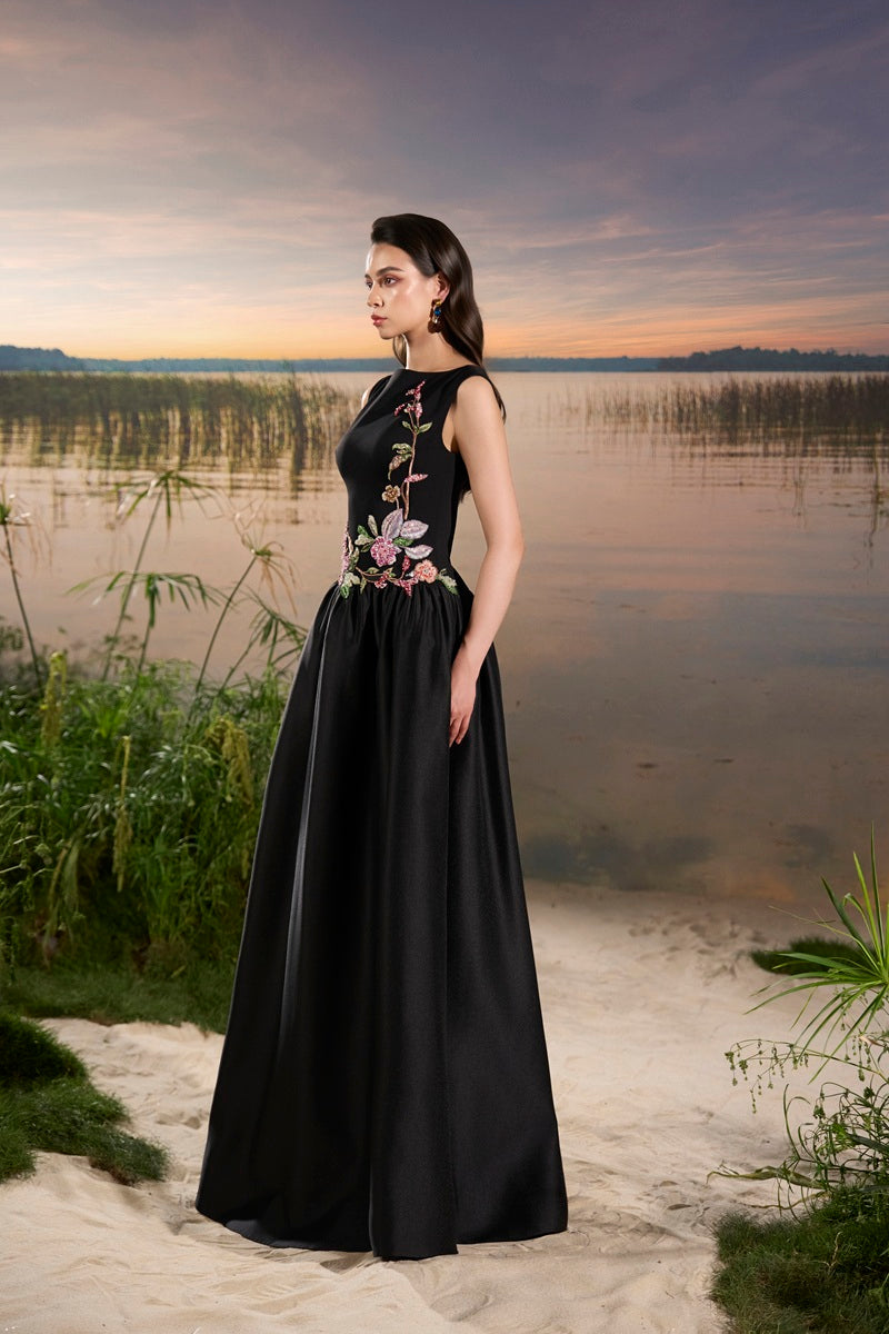 Black crepe embellished maxi dress by Tracy Studio featuring elegant design and intricate detailing.