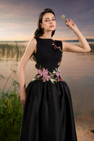 Black crepe embellished gown by Tracy Studio featuring elegant design and detailed embellishments, perfect for formal occasions.
