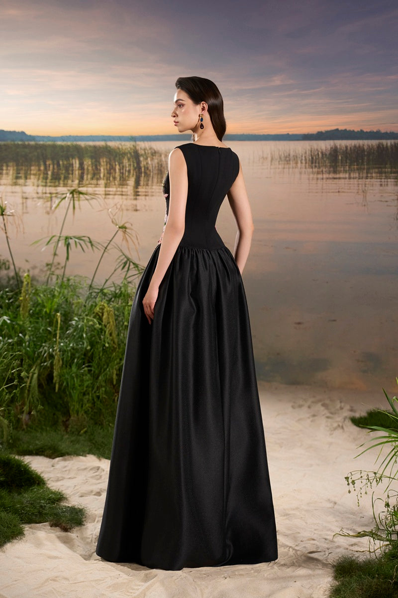 Black crepe embellished maxi dress by Tracy Studio, featuring elegant details and flowing fabric.