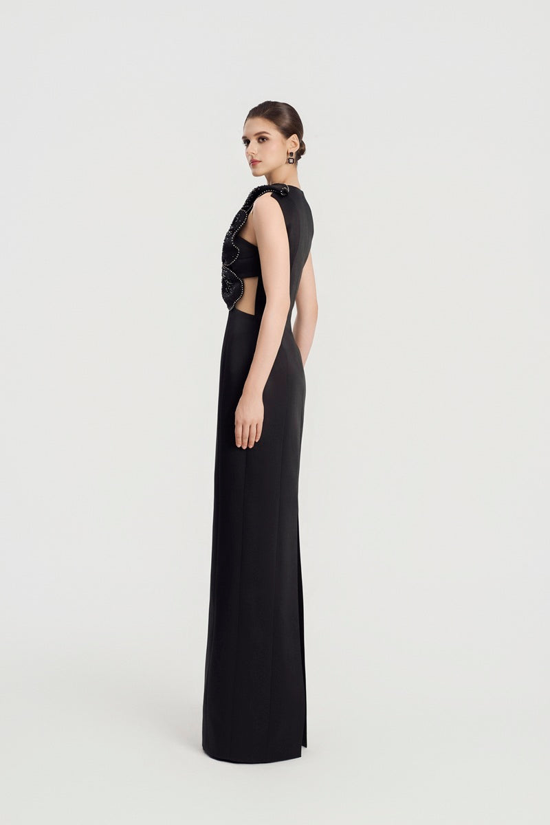 Elegant taffeta mikado embellished maxi dress by Tracy Studio with intricate details and a flowing silhouette.