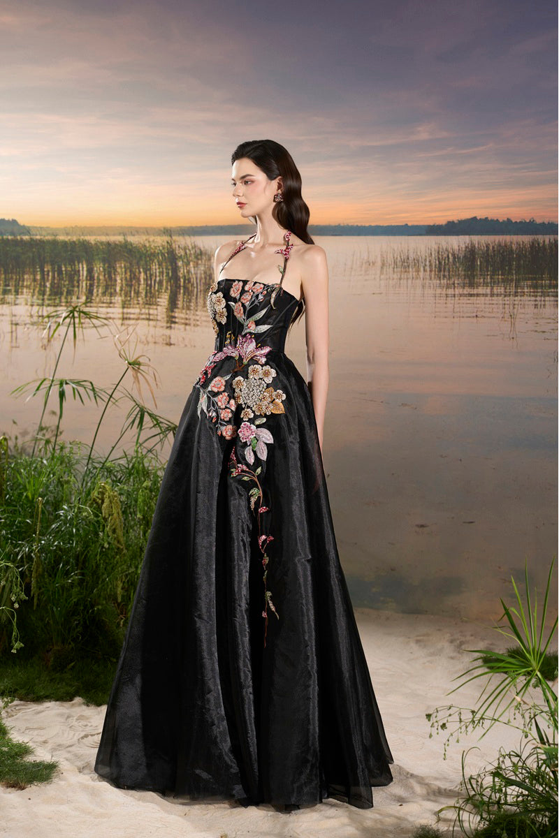 Black Tracy Studio maxi dress with organza floral bead embellishments and elegant design.