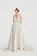 White taffeta strapless gown by Tracy Studio featuring a flowing design and elegant silhouette.