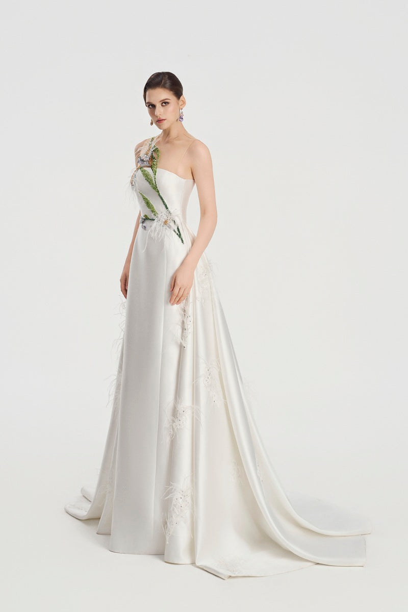 White taffeta strapless maxi dress by Tracy Studio, featuring elegant design and flowing fabric for sophisticated style.