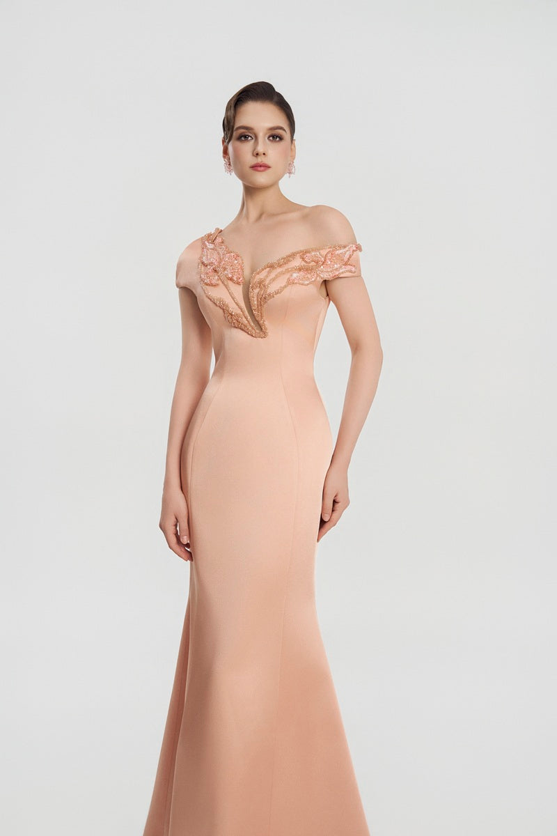 Peach taffeta mikado mermaid maxi dress by Tracy Studio featuring a fitted silhouette and elegant design.