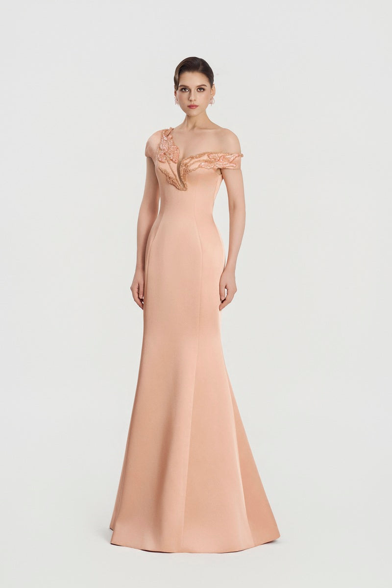 Peach taffeta mikado mermaid maxi dress by Tracy Studio, fitted silhouette with elegant fabric and intricate design details.