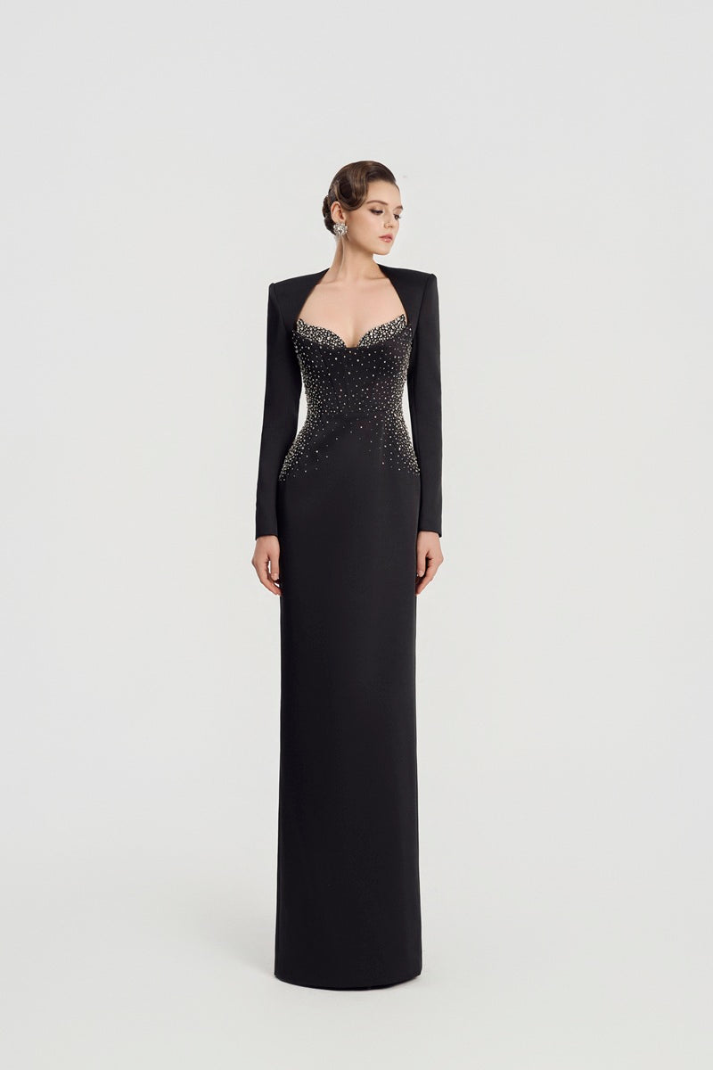Black embellished maxi dress by Tracy Studio featuring intricate detailing and elegant flowy fabric.