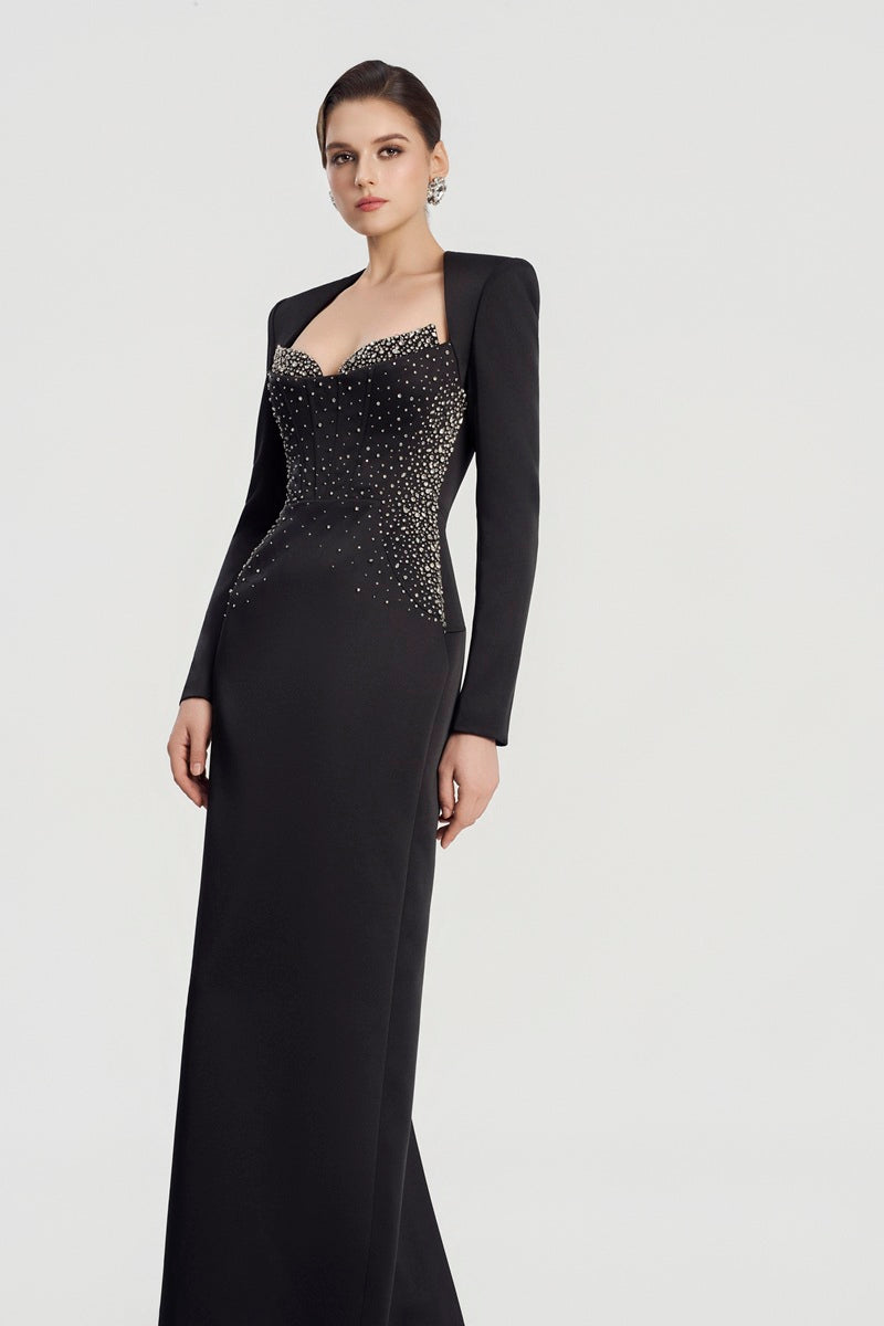 Black embellished maxi dress by Tracy Studio featuring intricate beadwork and flowing fabric.