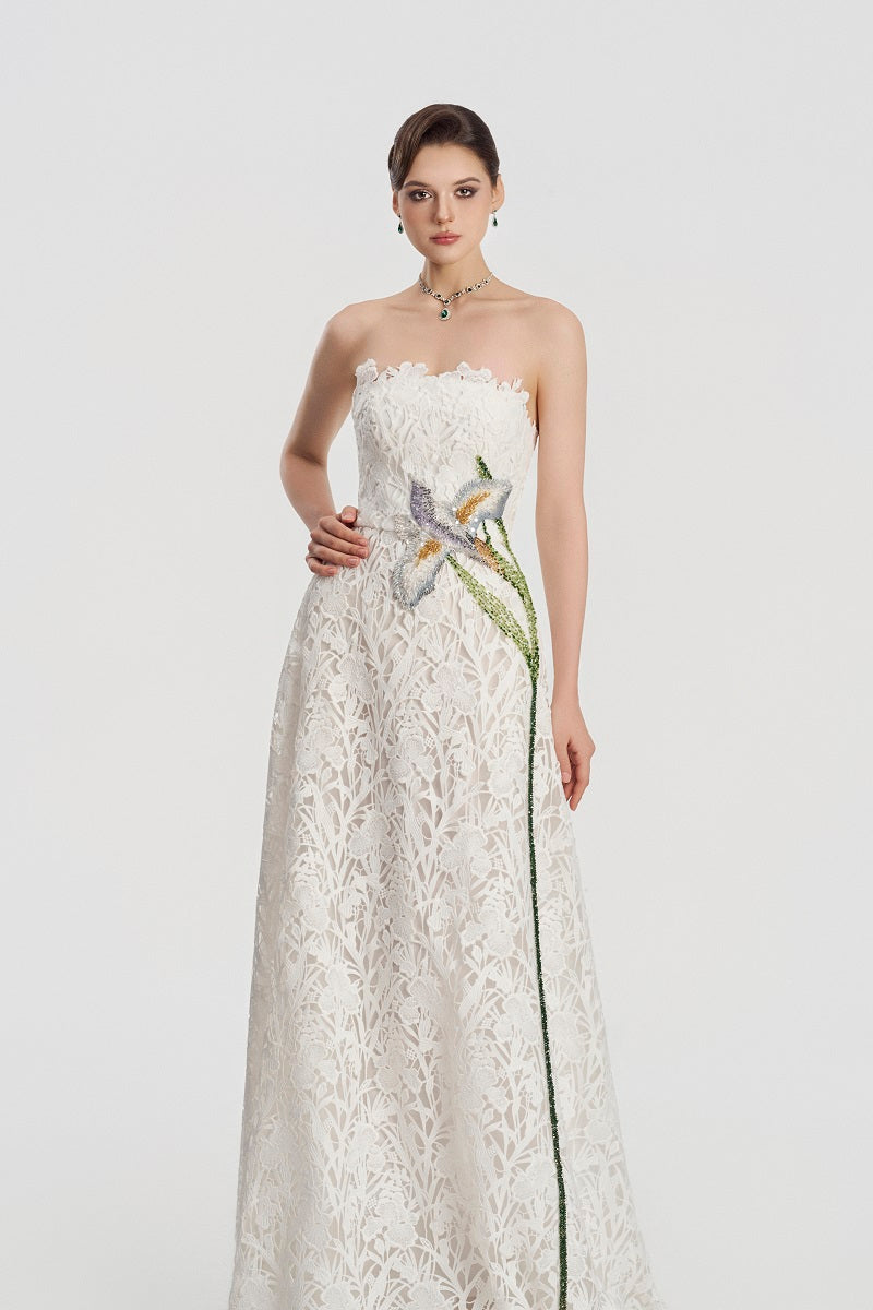 White lace beaded maxi dress by Tracy Studio, flowing design with intricate bead details, perfect for elegant occasions.