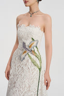 White lace beaded gown by Tracy Studio featuring intricate beadwork and elegant design, perfect for formal occasions.