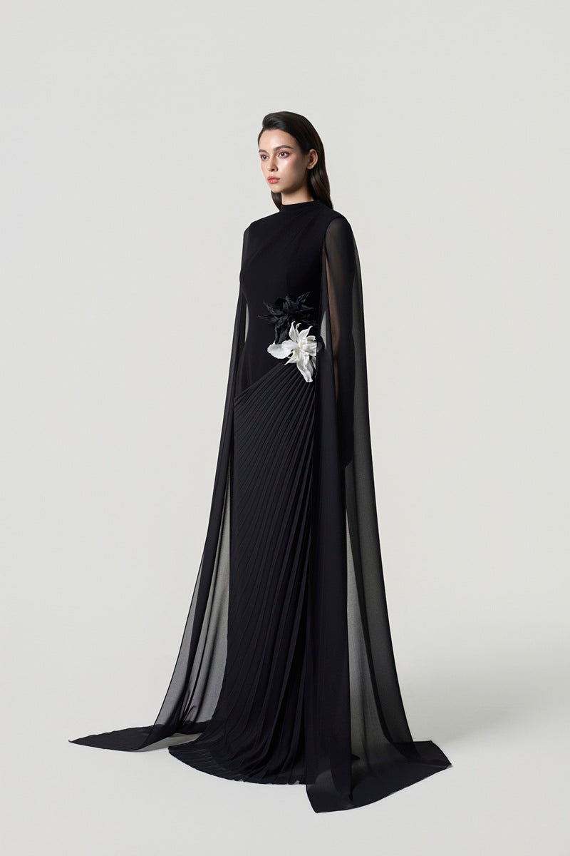 Black chiffon long sleeve maxi dress by Tracy Studio, flowing design with elegant long sleeves and a fitted waist.