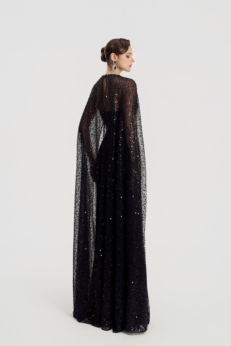 Black taffeta mikado boat neck maxi dress by Tracy Studio, featuring elegant fabric and a sleek, flowing silhouette.