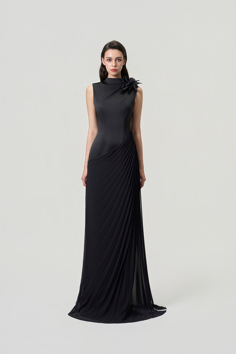 Black chiffon high neck maxi dress by Tracy Studio, flowing elegant design with long sleeves and a high neckline.