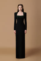Black crepe de chine silk-lined gown by I.H.F featuring a trapeze neckline, long sleeves, and elegant design.