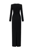 Black crepe de chine silk-lined gown with long sleeves and trapeze neckline, featuring green crystals, by I.H.F.