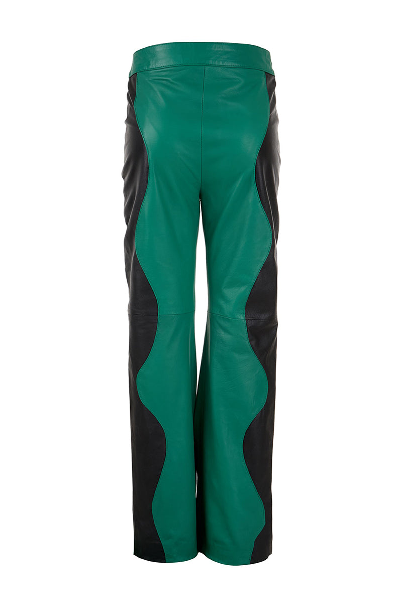 Black and Milano green two-tone leather trousers by MAZ Manuela Álvarez featuring a stylish mountain-inspired design.