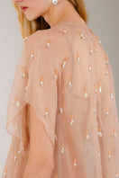 Nude mini dress and Asim silk skirt set by Mastani, featuring elegant embellishments and stylish design.