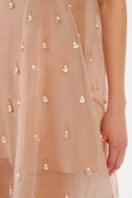 MASTANI UNA embellished nude mini dress paired with Asim silk skirt set, stylish and elegant fashion ensemble.