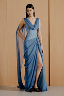 Urban Muse Orelis blue gown featuring elegant fabric and flowing design, perfect for formal occasions.