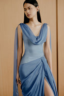 Blue Urban Muse gown from Orelis collection, featuring elegant fabric and stylish design, perfect for formal occasions.