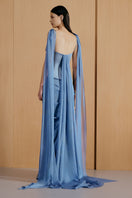 Urban Muse blue gown featuring elegant fabric and intricate design, perfect for formal occasions.