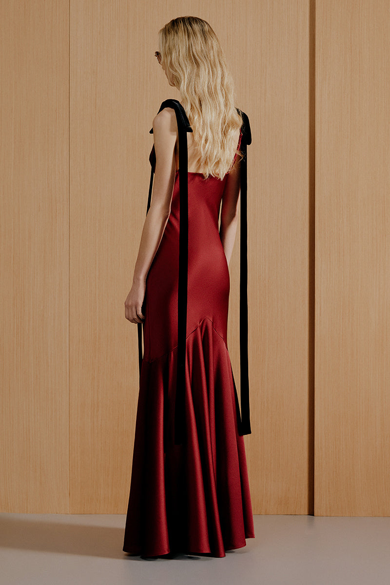 Urban Muse burgundy maxi gown featuring flowing fabric and elegant design, perfect for formal occasions.
