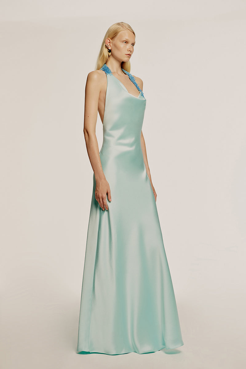 Urban Muse Aegea Maxi Dress in mint blue, flowing fabric, sleeveless design, perfect for summer or casual occasions.