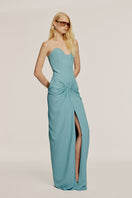 Aqua blue embellished gown by Urban Muse featuring intricate beadwork and elegant design, perfect for formal occasions.