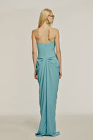Elegant aqua blue embellished gown by Urban Muse, featuring intricate details and a flowing silhouette.