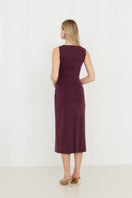 Purple Olivia Grape midi bodycon dress by UNDRESS, form-fitting with a sleek design, shown on a model.