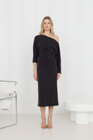 Black off-shoulder jersey midi dress by UNDRESS, featuring a fitted silhouette and elegant design for stylish occasions.