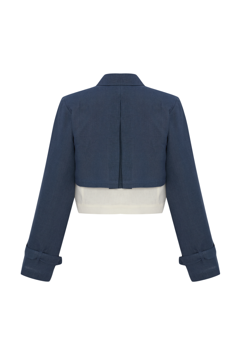 Labeca Claudia ecru and indigo linen layered jacket with a relaxed fit, showcasing its textured fabric and stylish design.