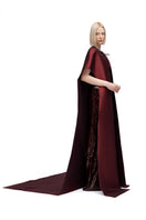 Moon Hakaan Yildirim Lily Cape in wine, stylish jacket with flowing fabric and elegant design, worn by a model.