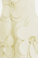 Light yellow CULT MIA X HAPPY CLOTHING Anahi fit and flare mini dress displayed on a hanger with a fitted bodice and flared skirt.