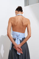 Blue and white harem top from Acaria Studio featuring a relaxed fit and stylish design, shown on a mannequin.