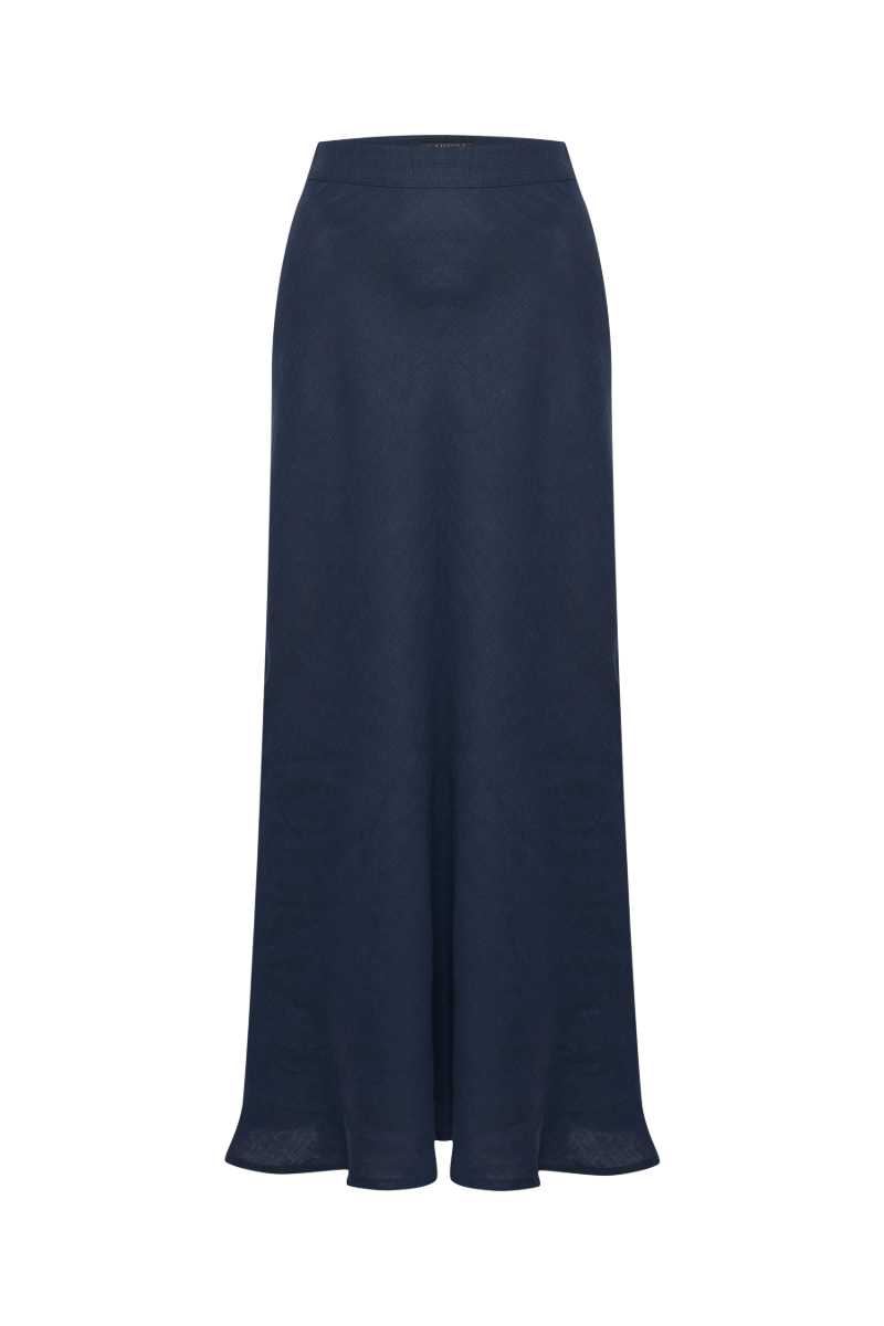 Labeca Clara Indigo linen maxi skirt displayed on a model, featuring a flowing design and elegant length.