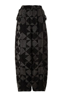 Maz Manuela Álvarez baggy pattern pants with loose fit and colorful geometric design, shown on a neutral background.
