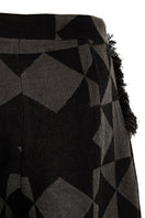 Maz Manuela Álvarez baggy pattern pants featuring a relaxed fit and vibrant geometric print on soft fabric.