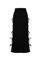 Labeca Carolina black linen bow midi skirt displayed with a high waist and bow detail, showcasing a stylish and elegant midi length design.