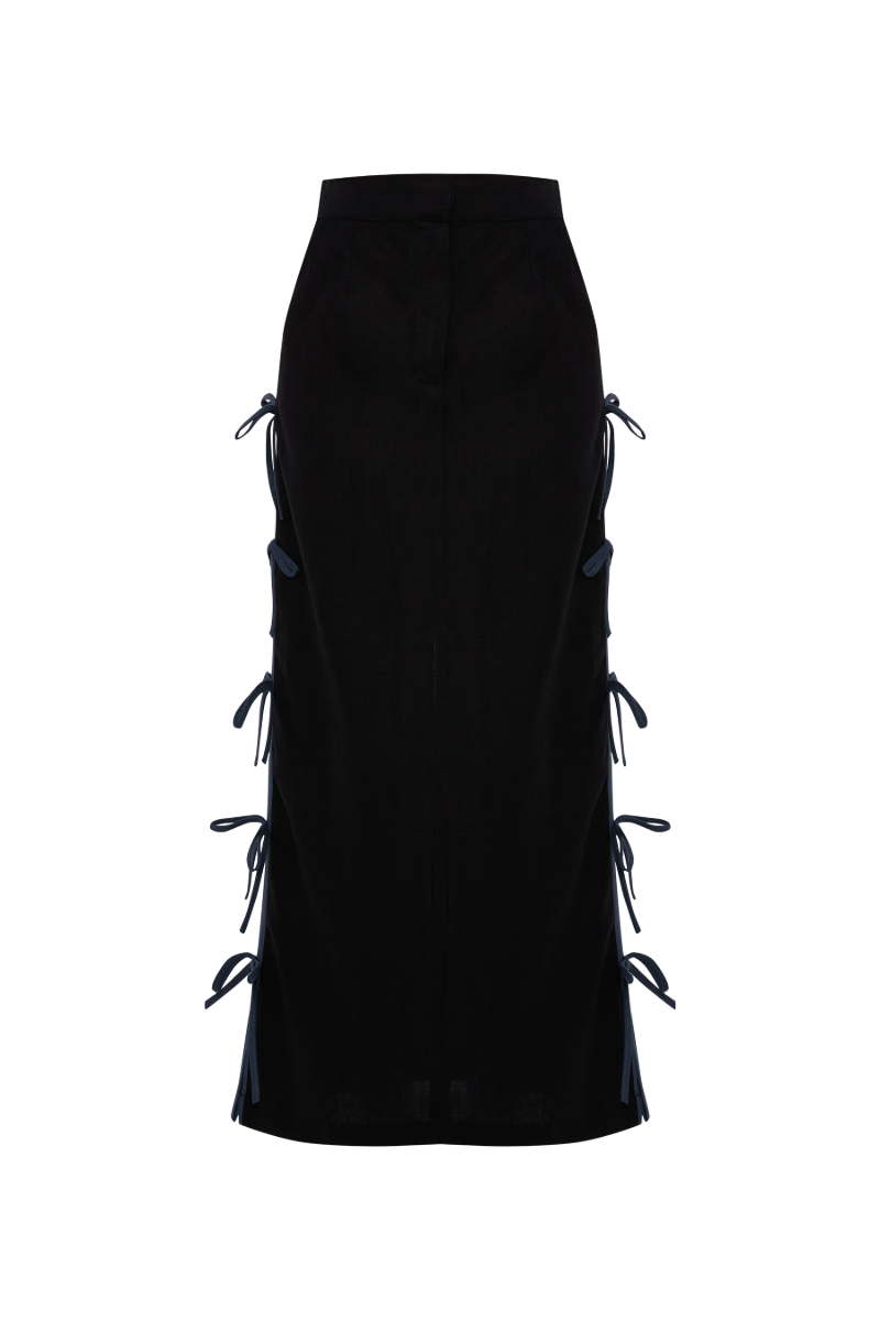 Labeca Carolina black linen bow midi skirt displayed with a high waist and bow detail, showcasing a stylish and elegant midi length design.