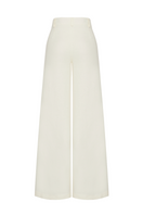 Light ecru linen pants by Labeca featuring a relaxed fit and natural fabric texture, perfect for casual and warm-weather wear.