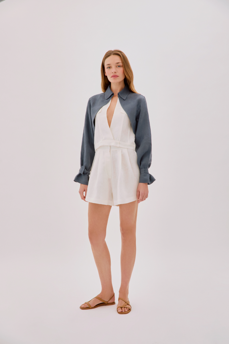 Labeca Claudia ecru and indigo linen layered jacket showing a stylish, lightweight jacket with layered fabric design.