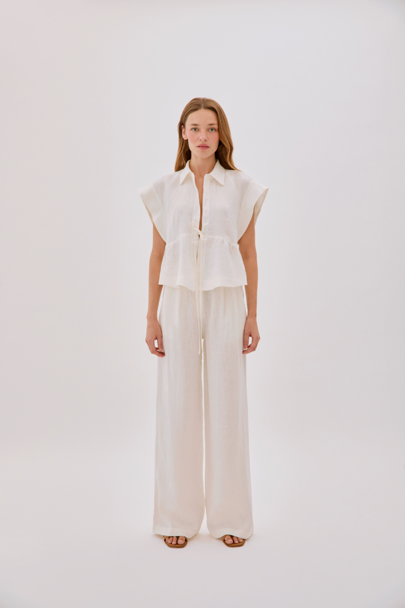 Labeca GALIA Ecru Linen Pants displayed with a relaxed fit, featuring a high waist and lightweight breathable fabric.