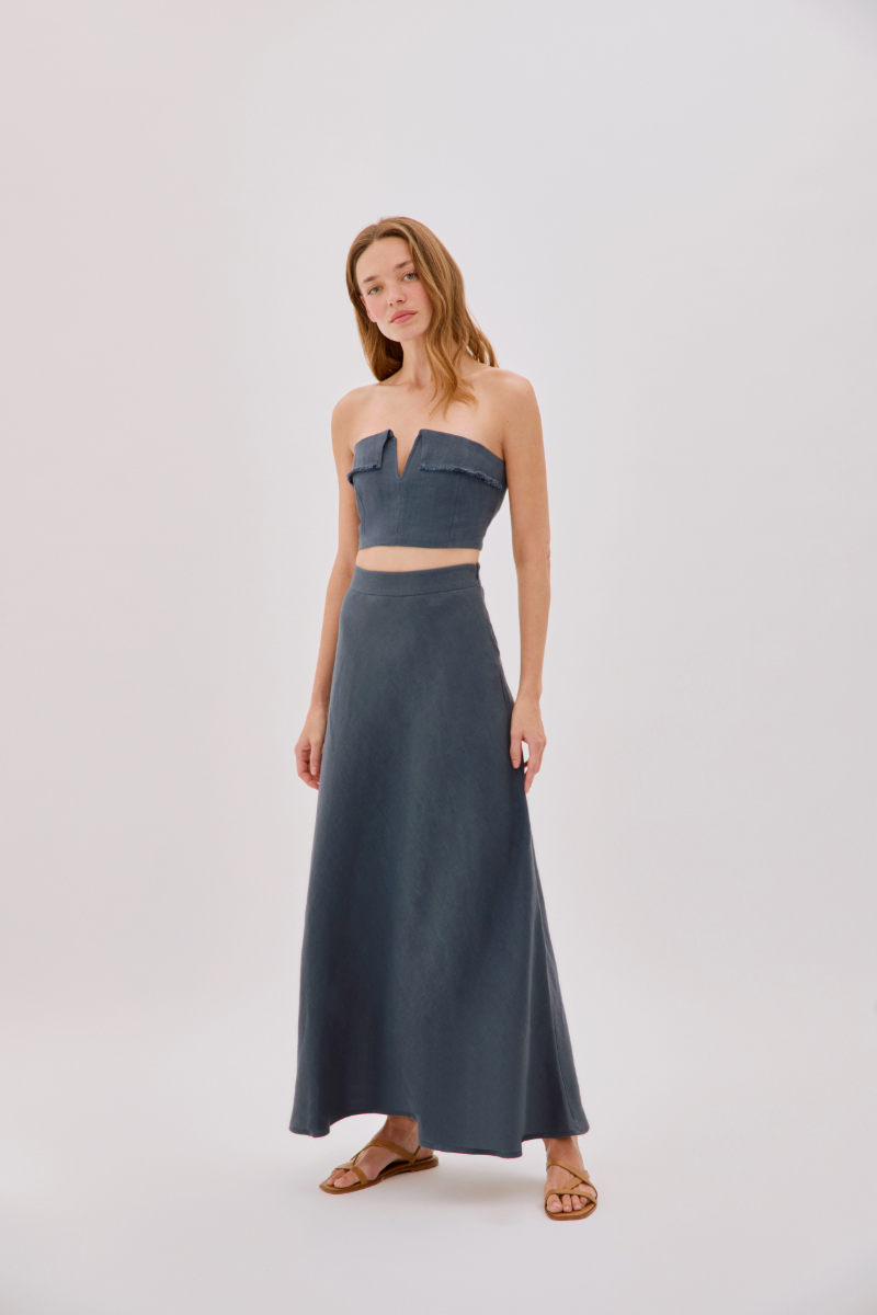 Navy linen fringe V-neck crop top by Labeca featuring a stylish design with fringe details and a V neckline.