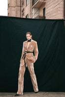 Vaska caramel tailored silk velvet jacket with a sleek fit and elegant design, shown on a model.